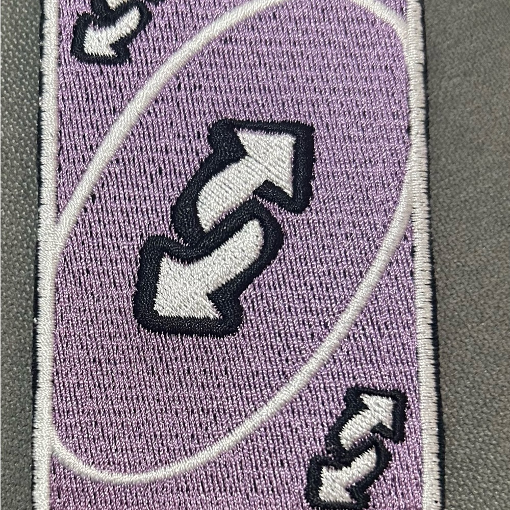 Purple Embroidered Patch with Arrows